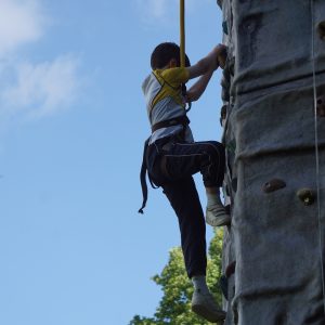 student climbing