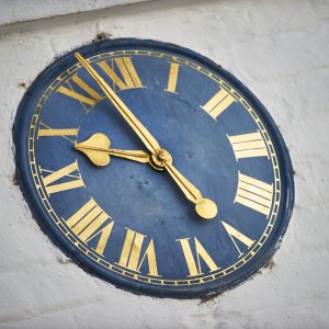 a blue and gold clock