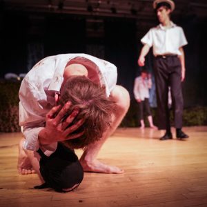 students in a theatre performance