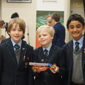 students showing off their made toy